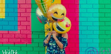 Woman with Happy Balloons
