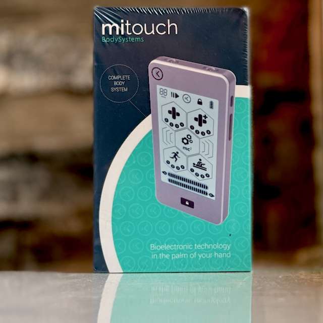 NuroKor MiTouch device with electrode wires, gel pads, and USB cable