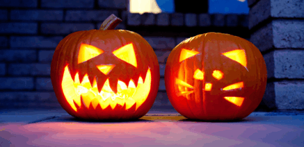 Carved Halloween pumpkins showing how to reuse pumpkin flesh for soup and seeds