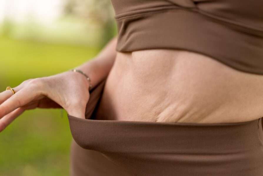 Pharmacist providing body composition analysis to support a 12-month post-GLP-1 plan