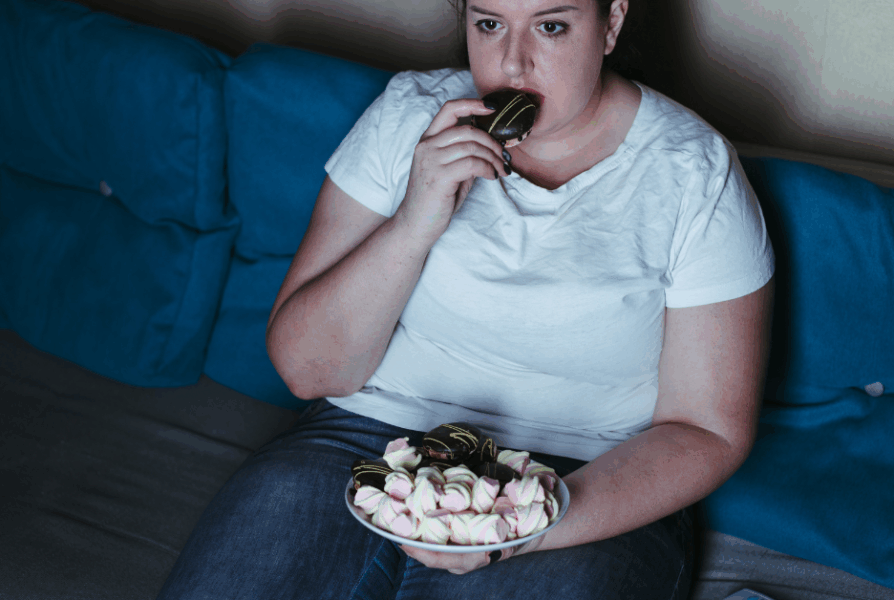 Person with chronic joint pain reaching for comfort food